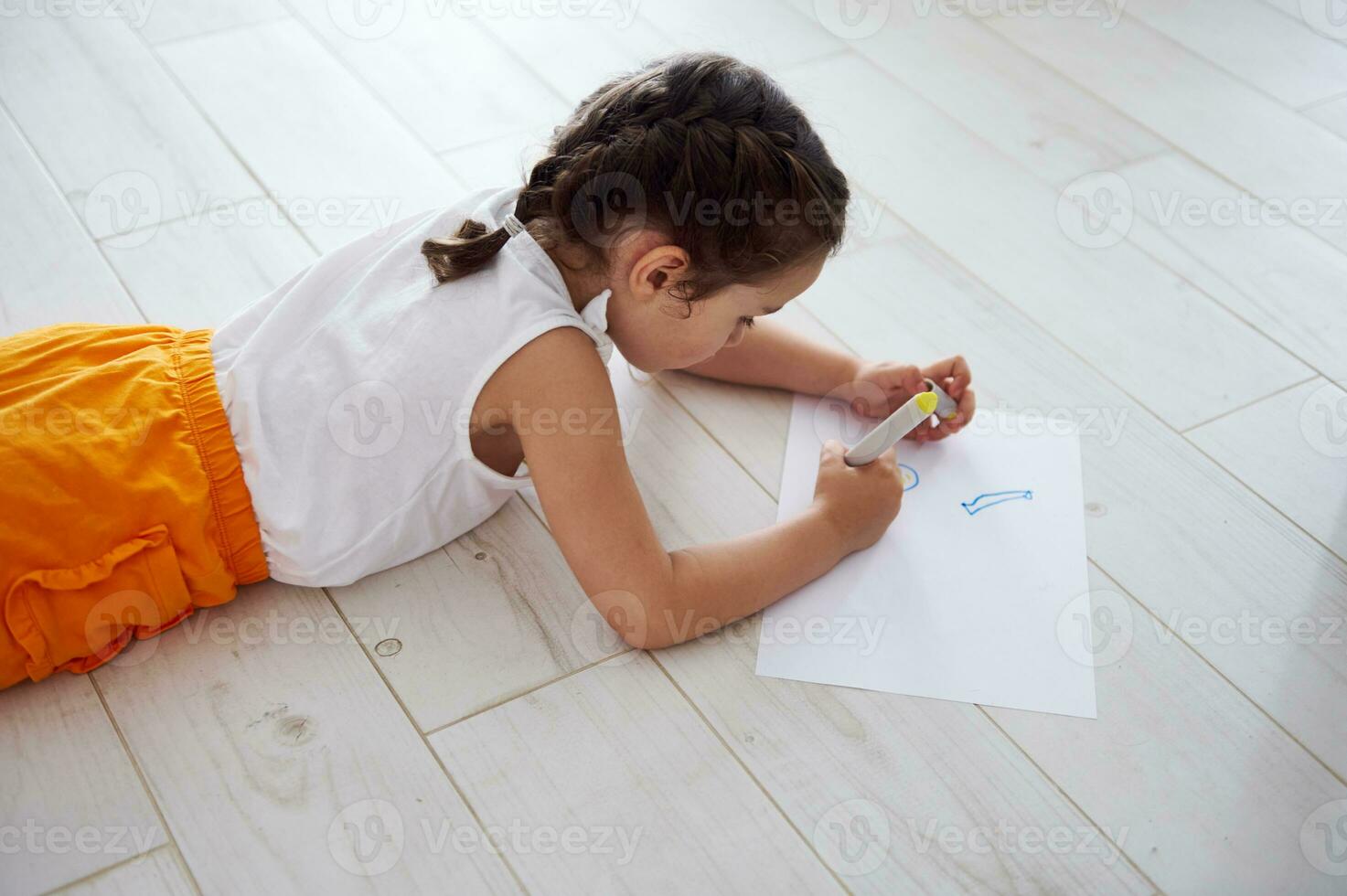 Children. Hobby. Leisure activity. Creativity, Kids development and education concept. Little kid girl draws a picture. photo