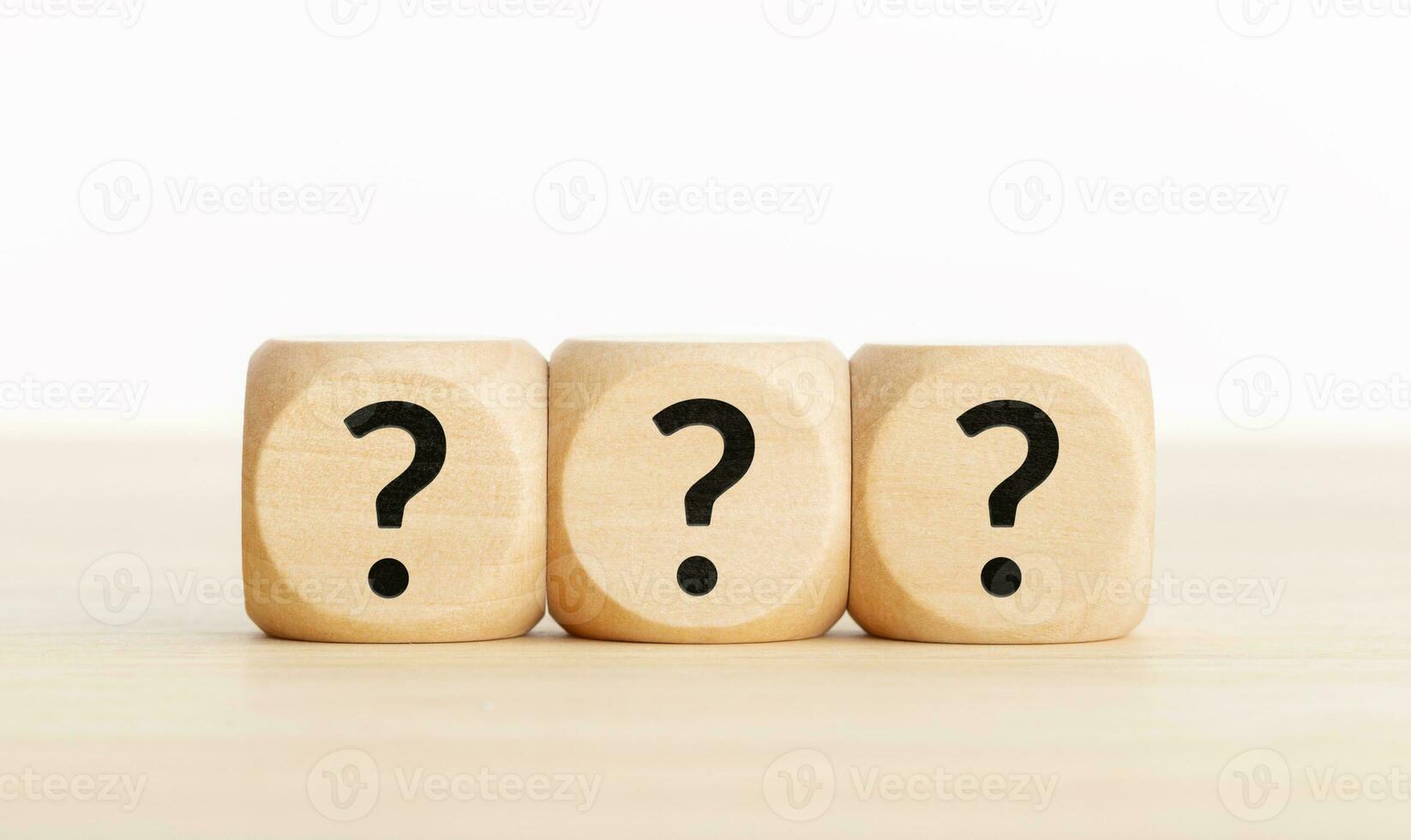 Question mark on wooden blocks. Copy space photo