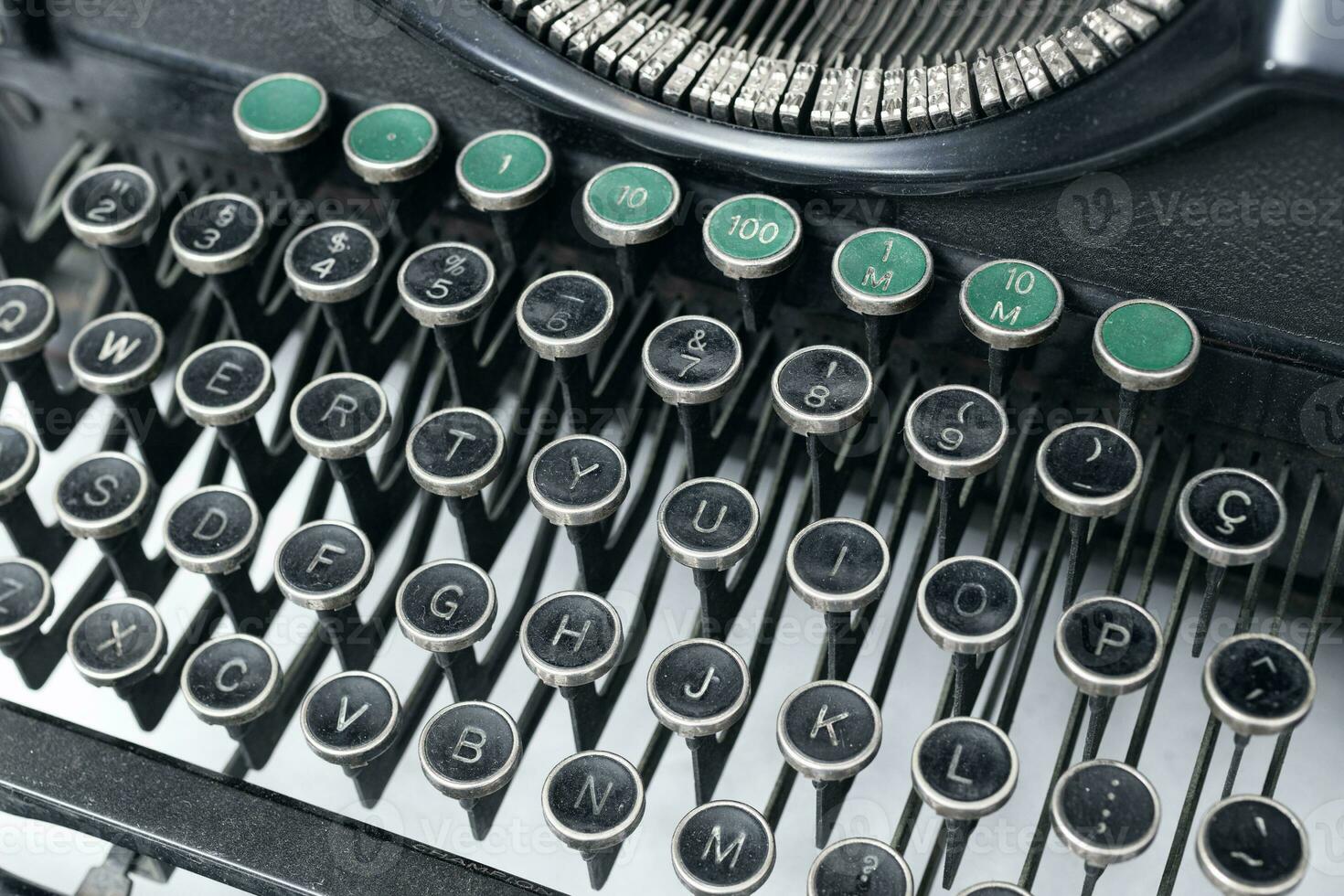 Close up view of an old typewriter keys. Selective focus photo