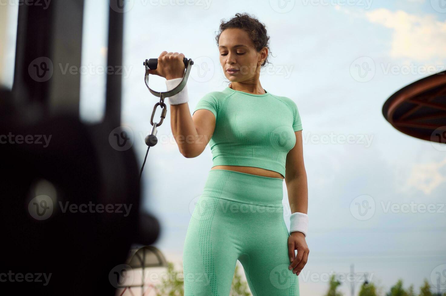 beautiful muscular fit woman exercising building muscles and fitness woman  doing exercises in the gym. Fitness - concept of healthy lifestyle 5247005  Stock Photo at Vecteezy