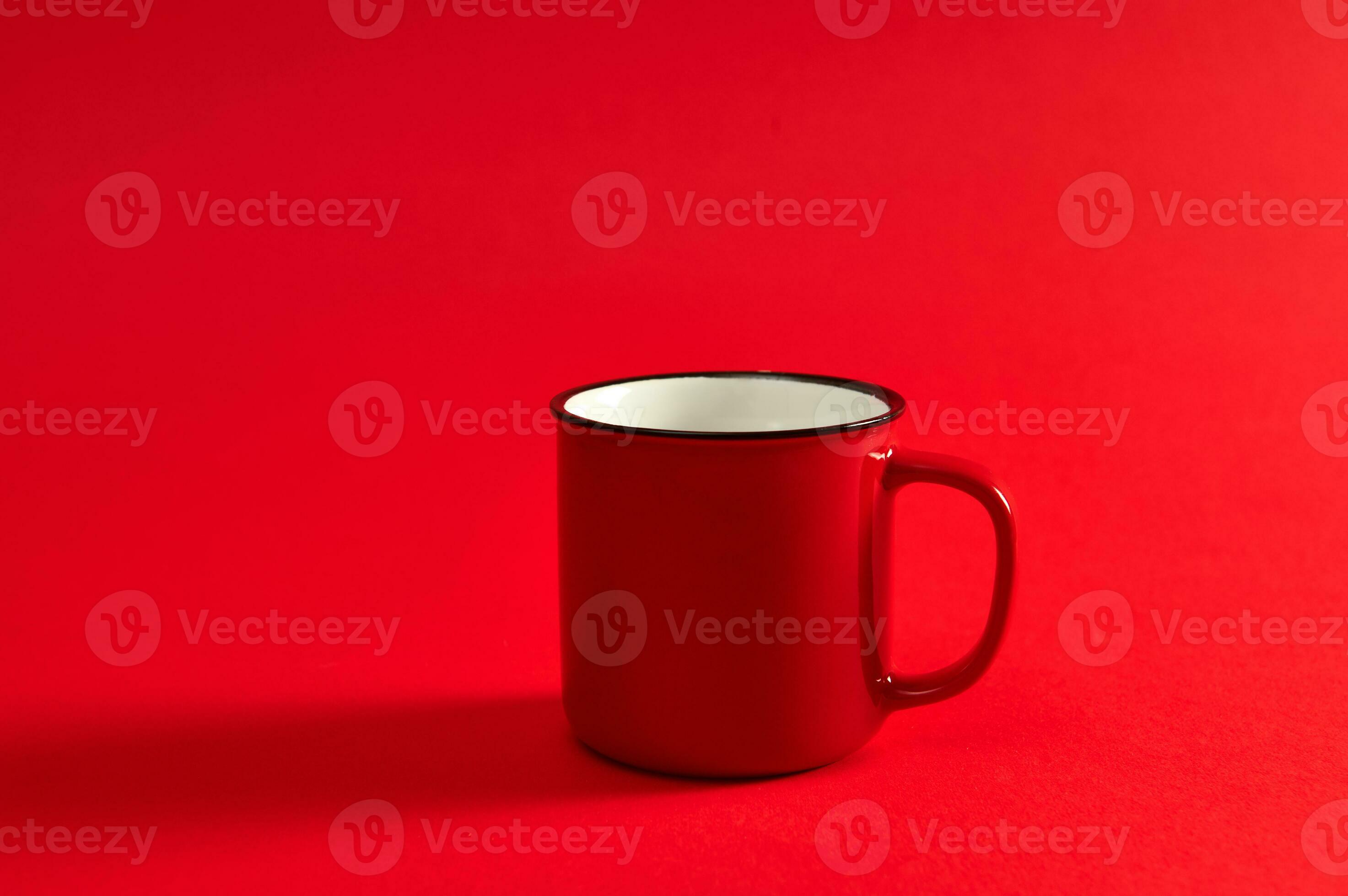 Closeup shot of stacks of red and green plastic cups isolated on a