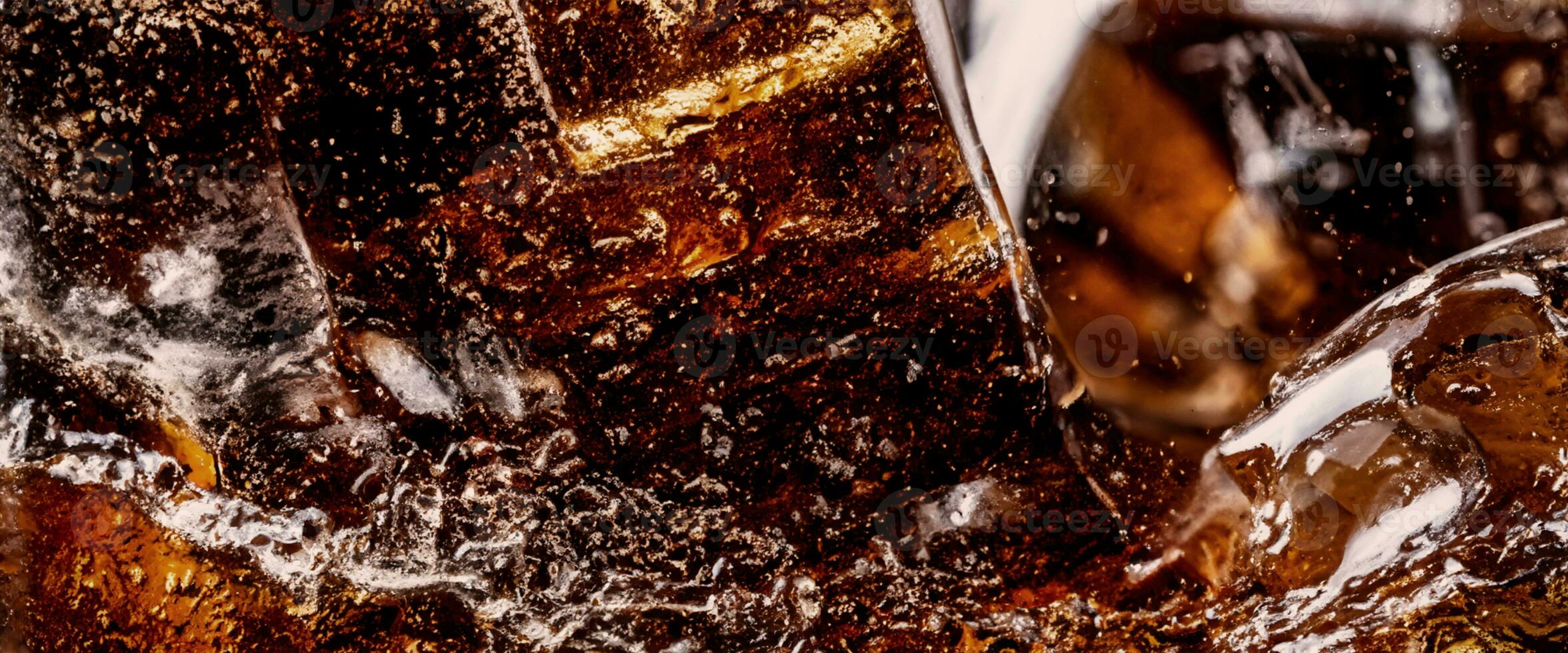 Cola soda and ice splashing fizzing or floating up to top of surface photo