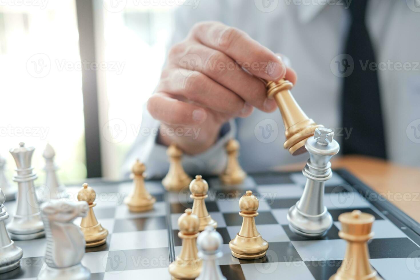 Businessman play with chess game. success management concept of business strategy and tactic challenge. photo