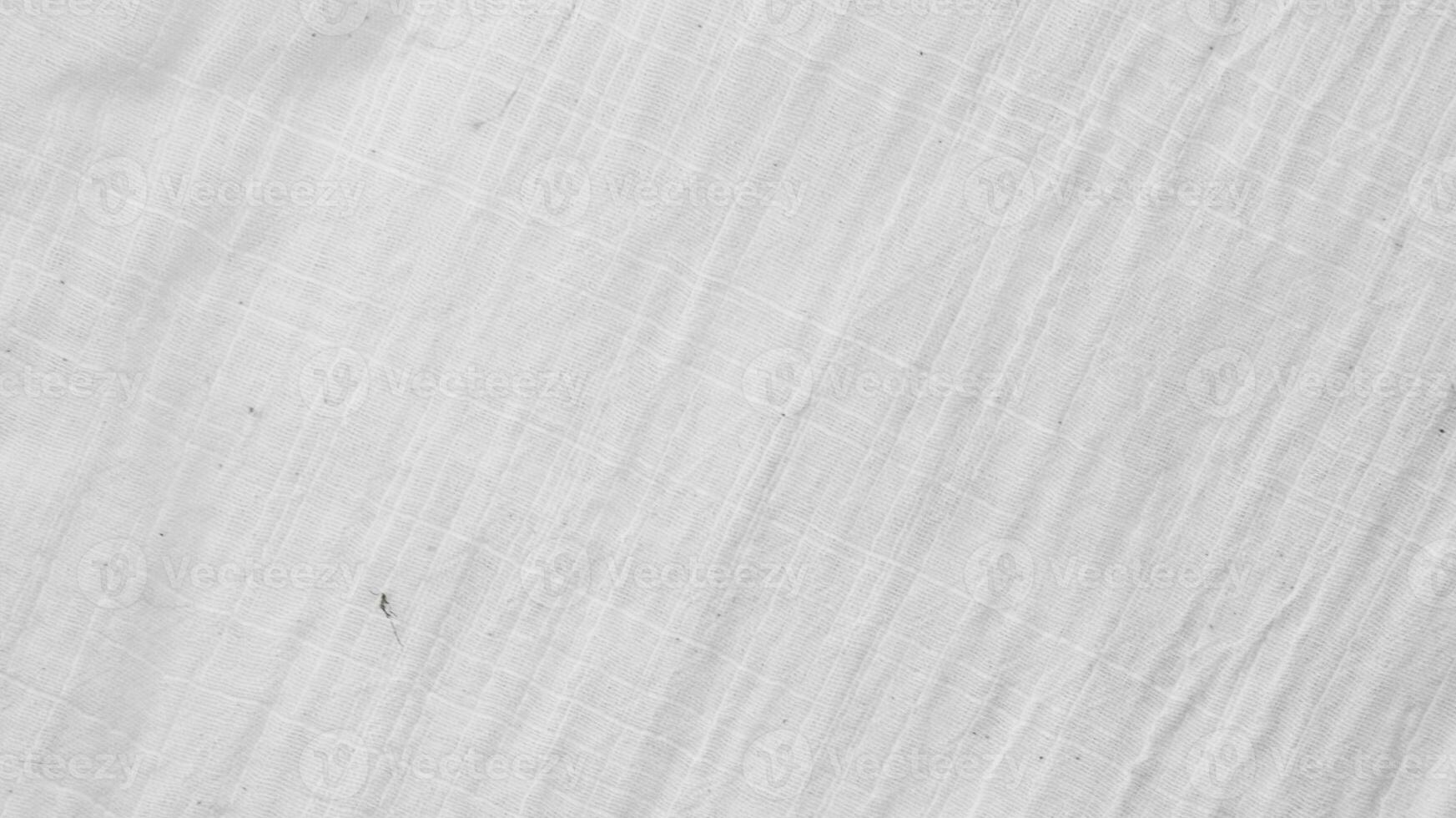 Organic Fabric cotton backdrop White linen canvas crumpled natural cotton fabric Natural handmade linen top view background  organic Eco textiles White Fabric linen texture photo