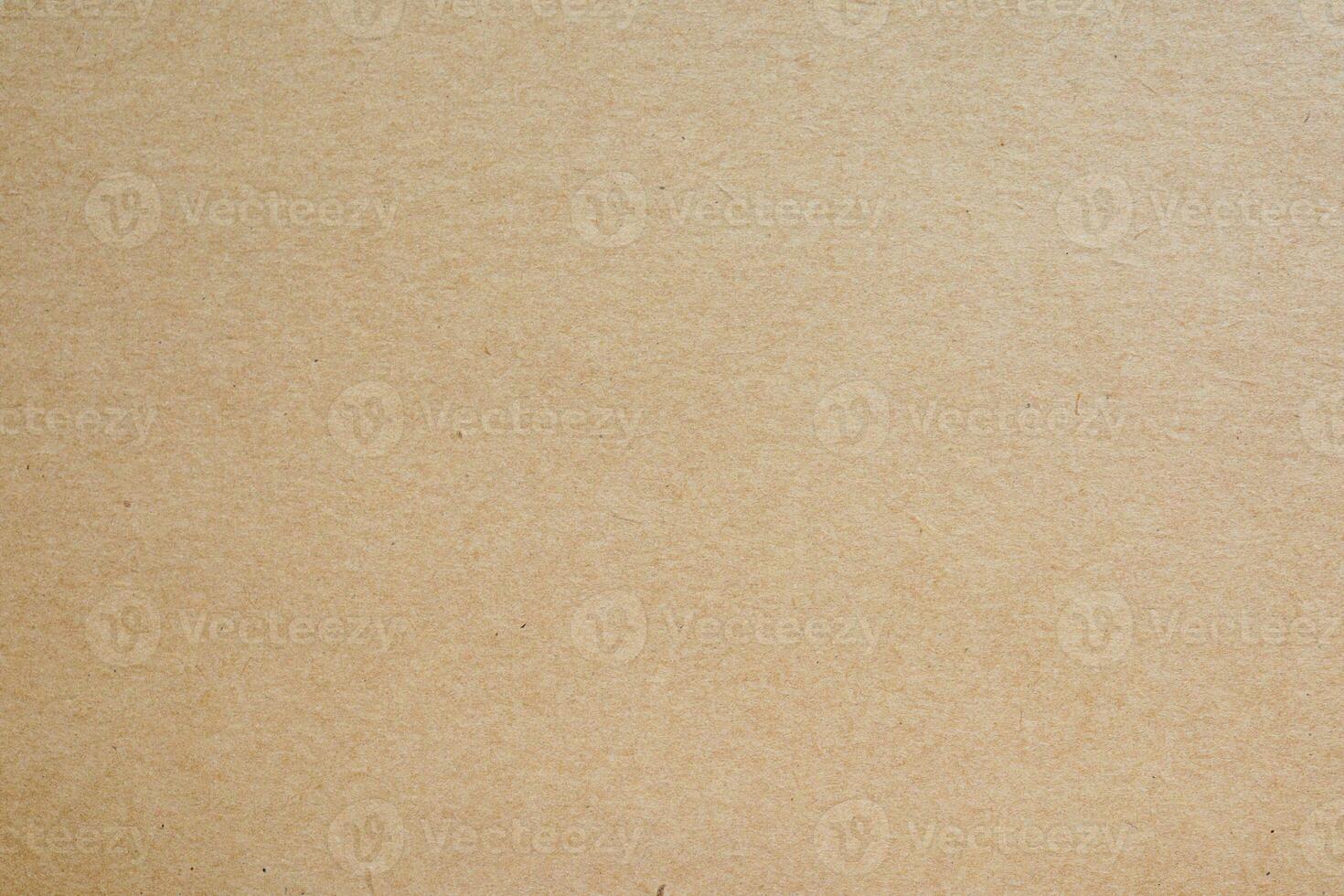 Old Kraft paper craft vintage pattern. brown recycled paper texture background photo