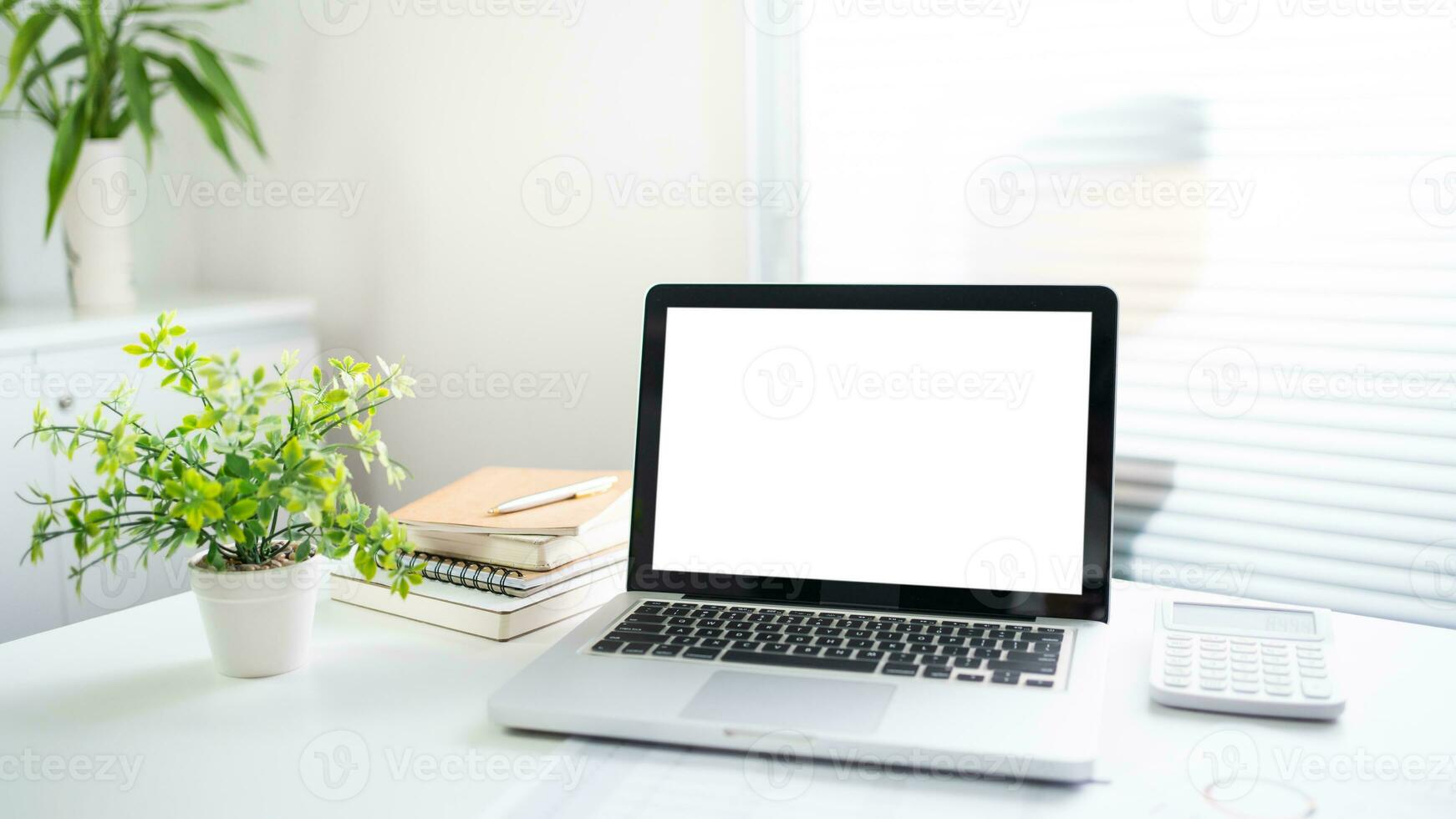 Laptop with Mock up blank screen on wooden table in front of cafe space for text. product display computer laptop montage- technology Freelance work concept photo