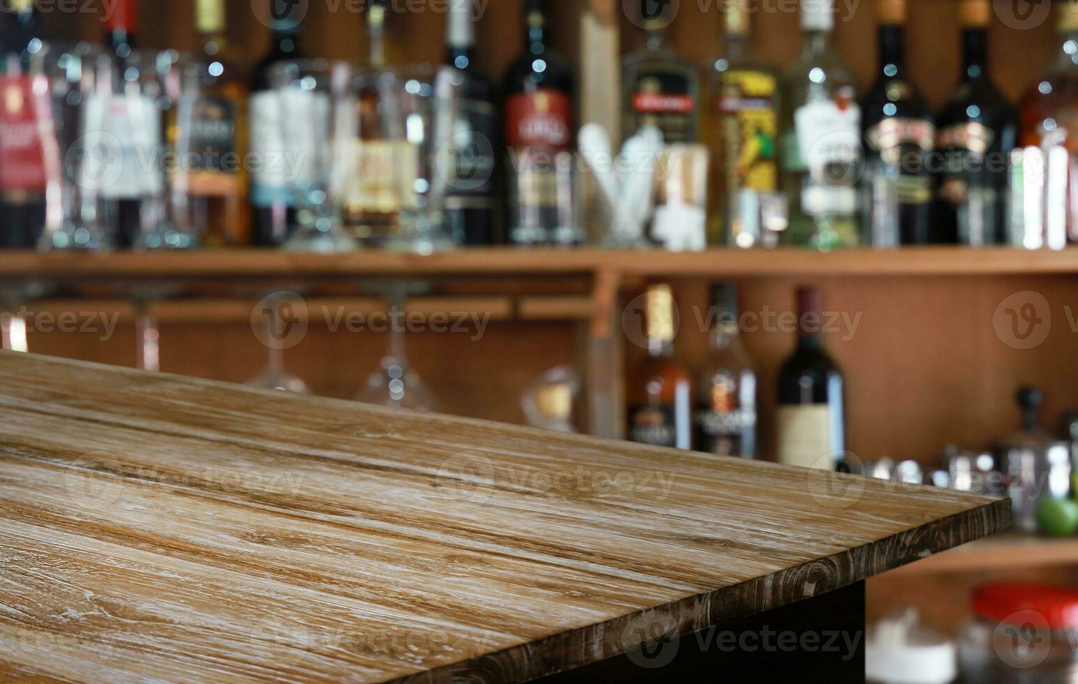 Wood Table Top in Blur Background room interior with empty copy space. photo