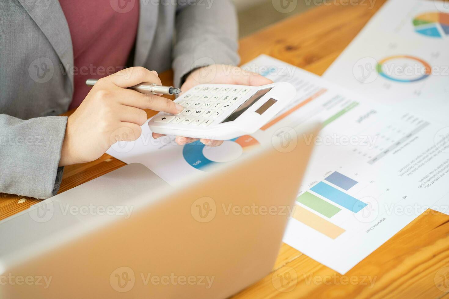 Calculating Cost Economic budget saving and investment concept analyzing investment charts and calculator Accounting Concept photo