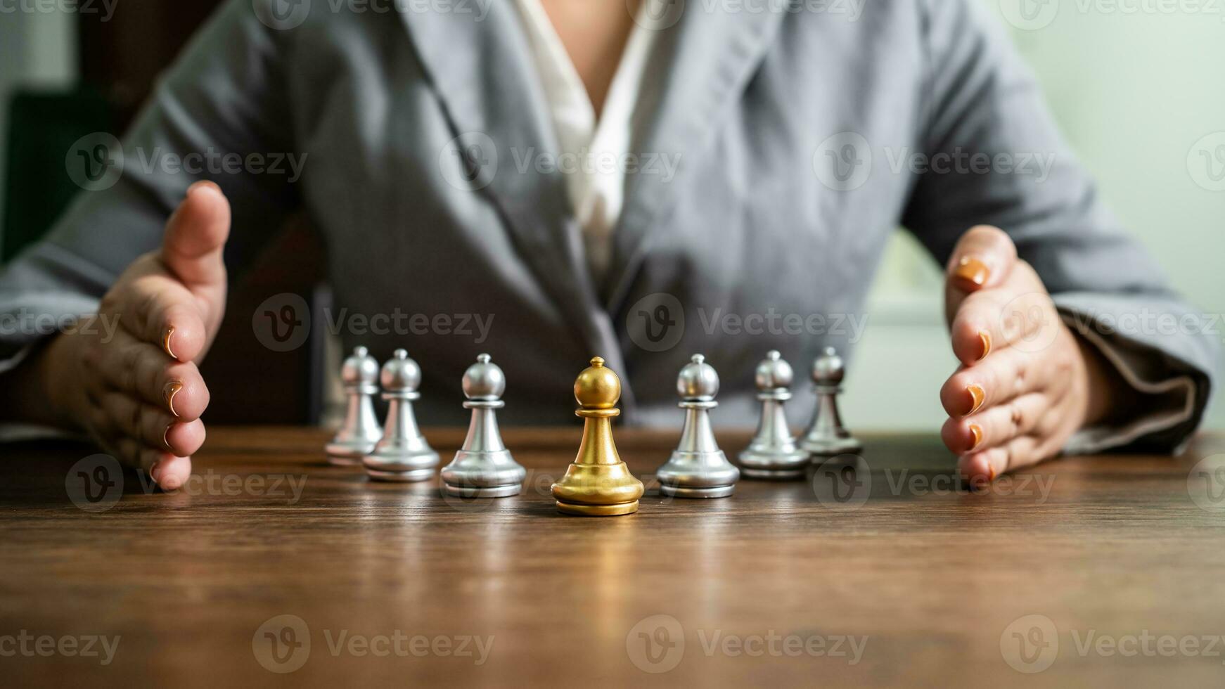 Chess leader and team. Human resources concept career management with clasped hands planning strategy with chess figures. leadership or success teamwork. Inspiration idea of goal photo