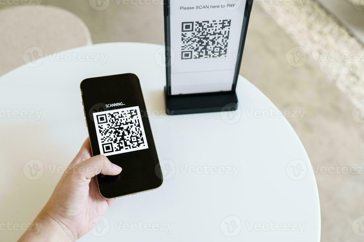 Qr code payment. E wallet. Man scanning tag accepted generate digital pay without money.scanning QR code online shopping cashless payment and verification technology concept. photo