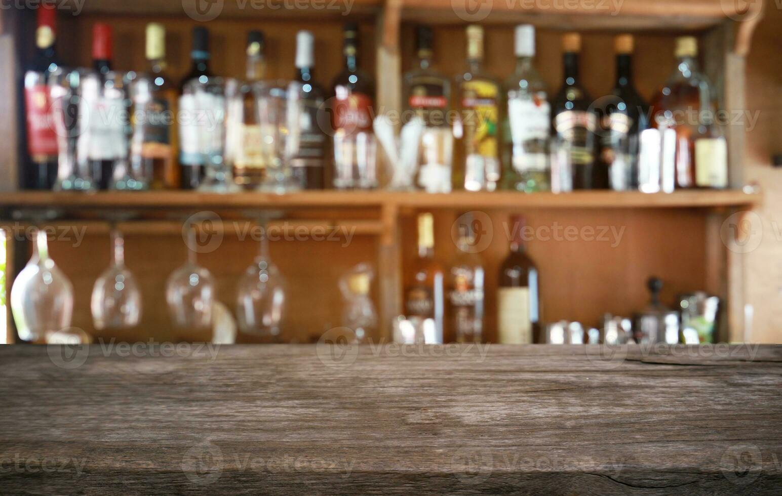 Wood Table Top in Blur Background room interior with empty copy space. photo