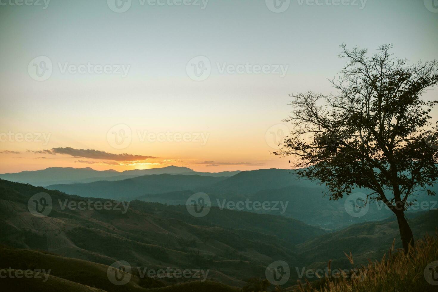 Summer mountains with sunset view of nature cliff mountain. photo