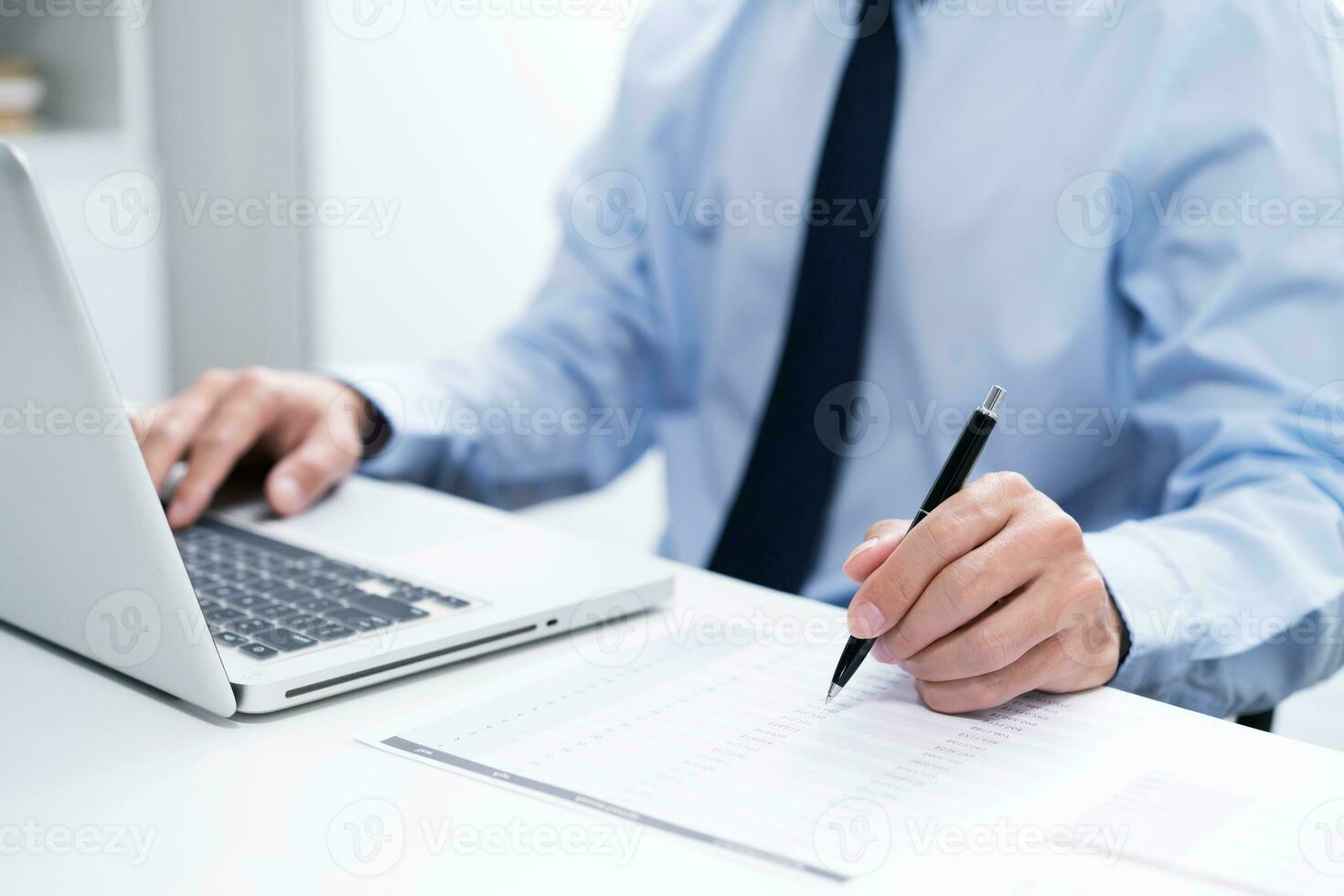 Business man working by using laptop computer Hands typing on a keyboard. Professional investor working new start up project. business planning in office. Technology business photo