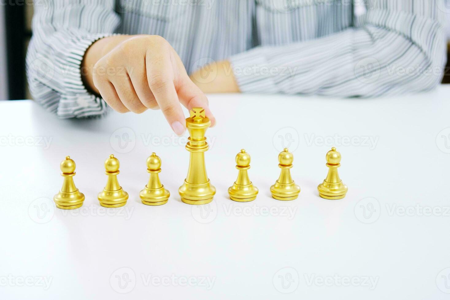 Human resources concept career management with clasped hands planning strategy with chess figures. photo