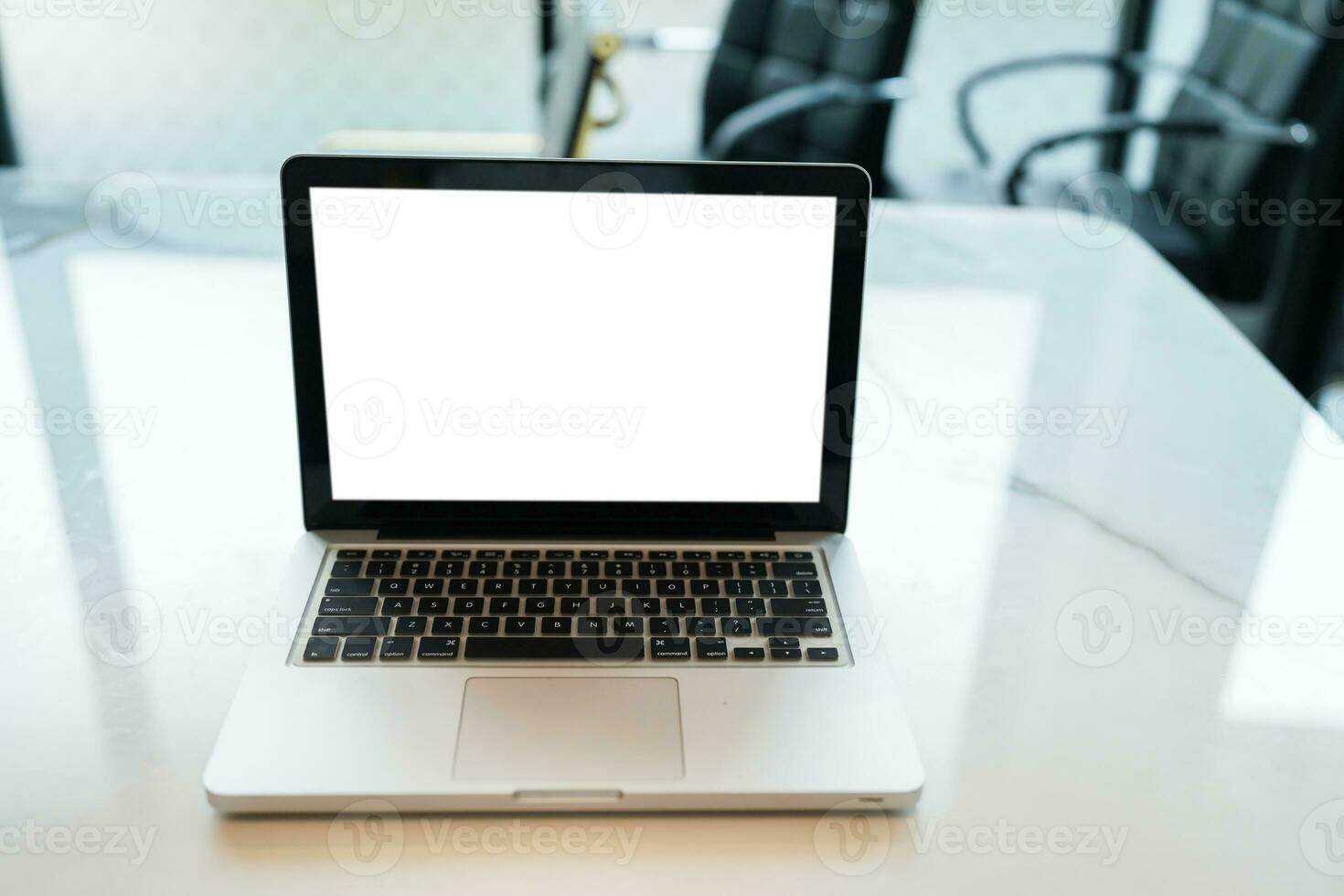 Laptop with Mock up blank screen on table in front of cafe space for text. product display computer laptop montage- technology concept photo