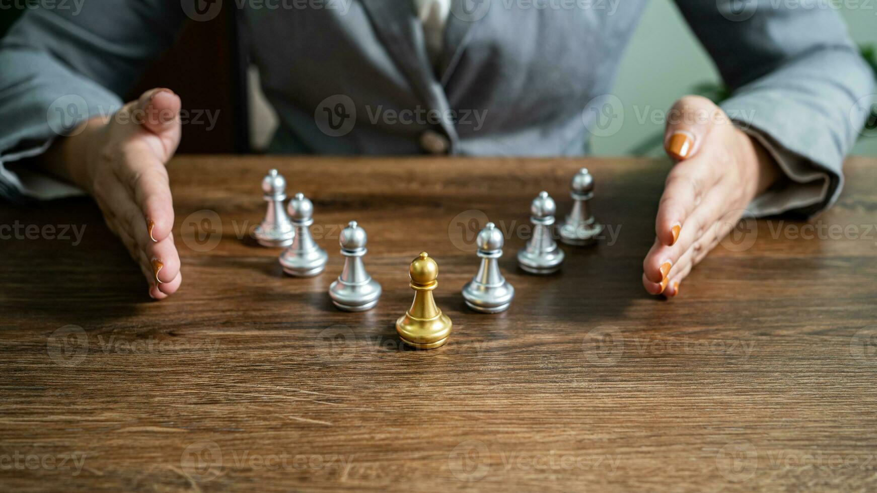 Chess leader and team. Human resources concept career management with clasped hands planning strategy with chess figures. leadership or success teamwork. Inspiration idea of goal photo