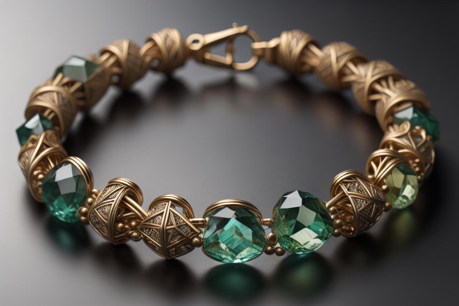 Bracelet with emeralds on a black background close up. photo