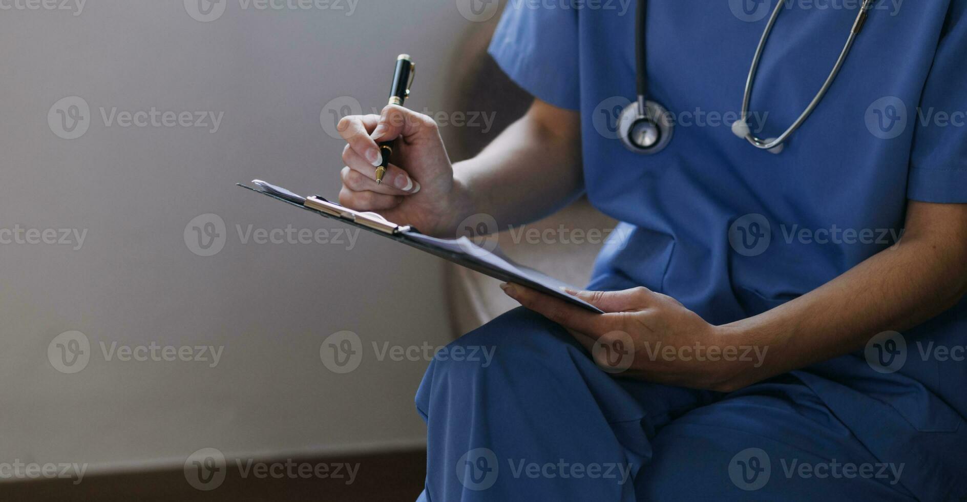 Homecare nursing service and elderly people cardiology healthcare. Close up of young hispanic female doctor nurse check mature caucasian man patient heartbeat using stethoscope during visit photo