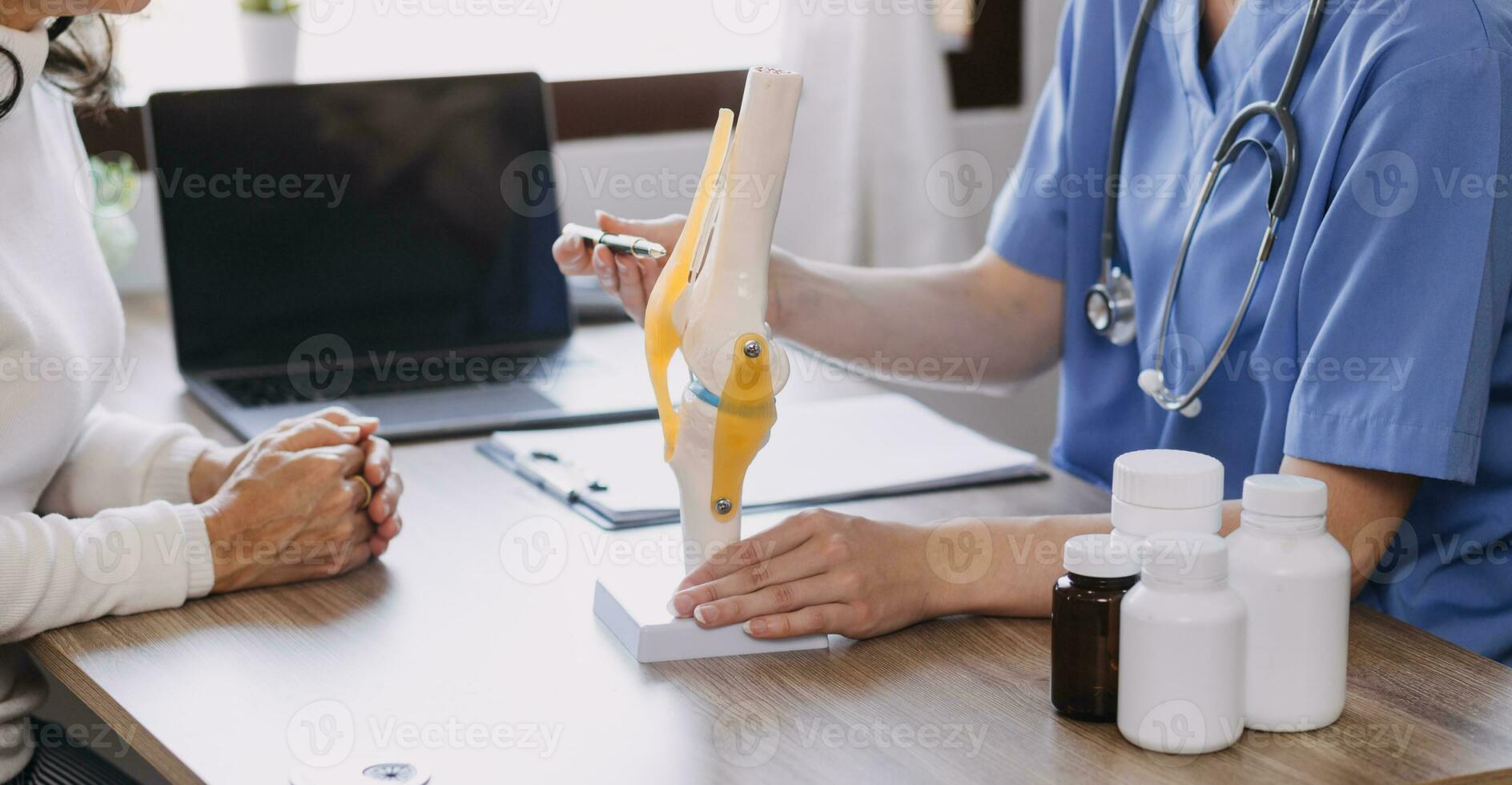 Homecare nursing service and elderly people cardiology healthcare. Close up of young hispanic female doctor nurse check mature caucasian man patient heartbeat using stethoscope during visit photo