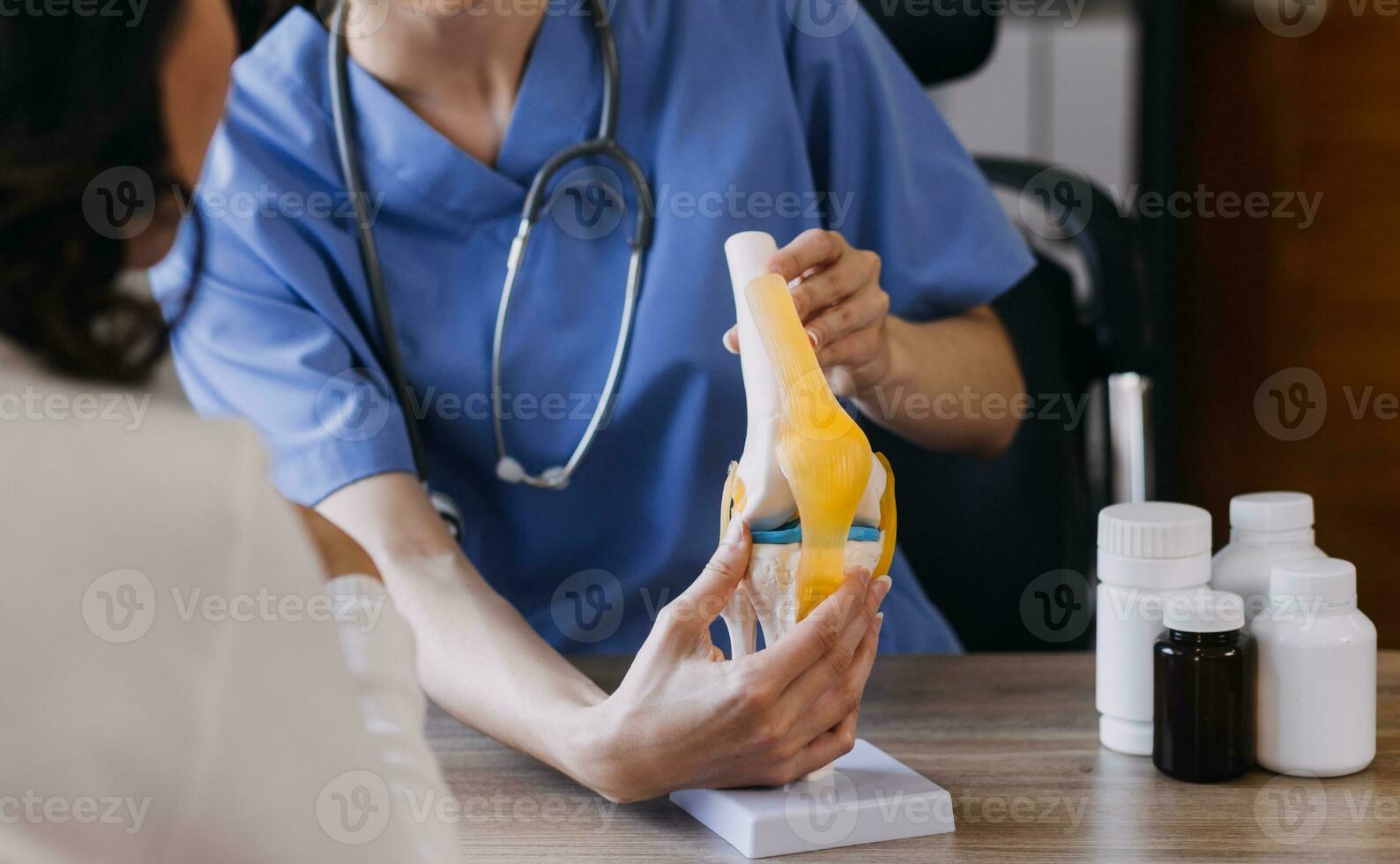 Homecare nursing service and elderly people cardiology healthcare. Close up of young hispanic female doctor nurse check mature caucasian man patient heartbeat using stethoscope during visit photo