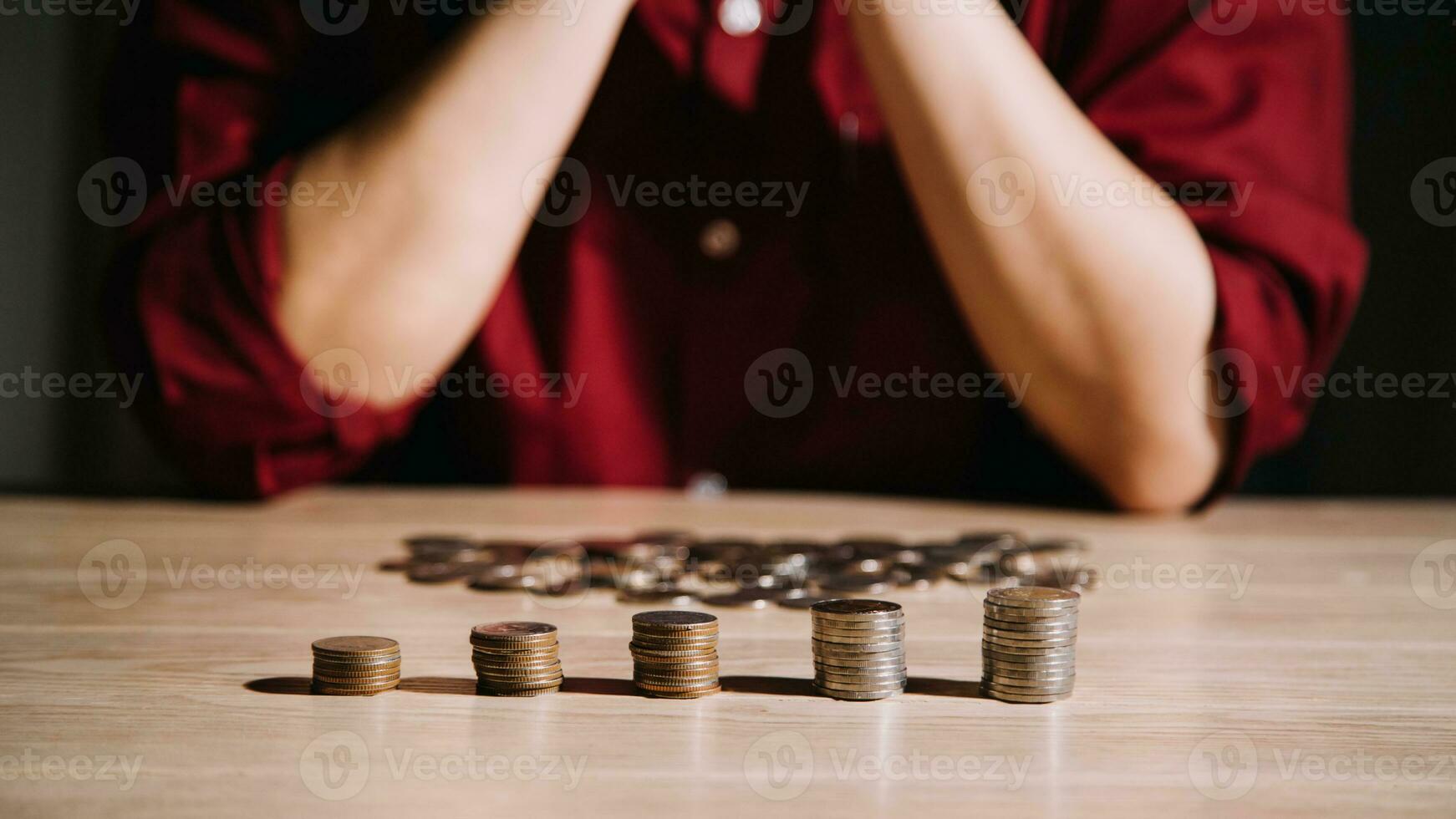 Saving money concept preset by Male hand putting money coin stack growing business photo