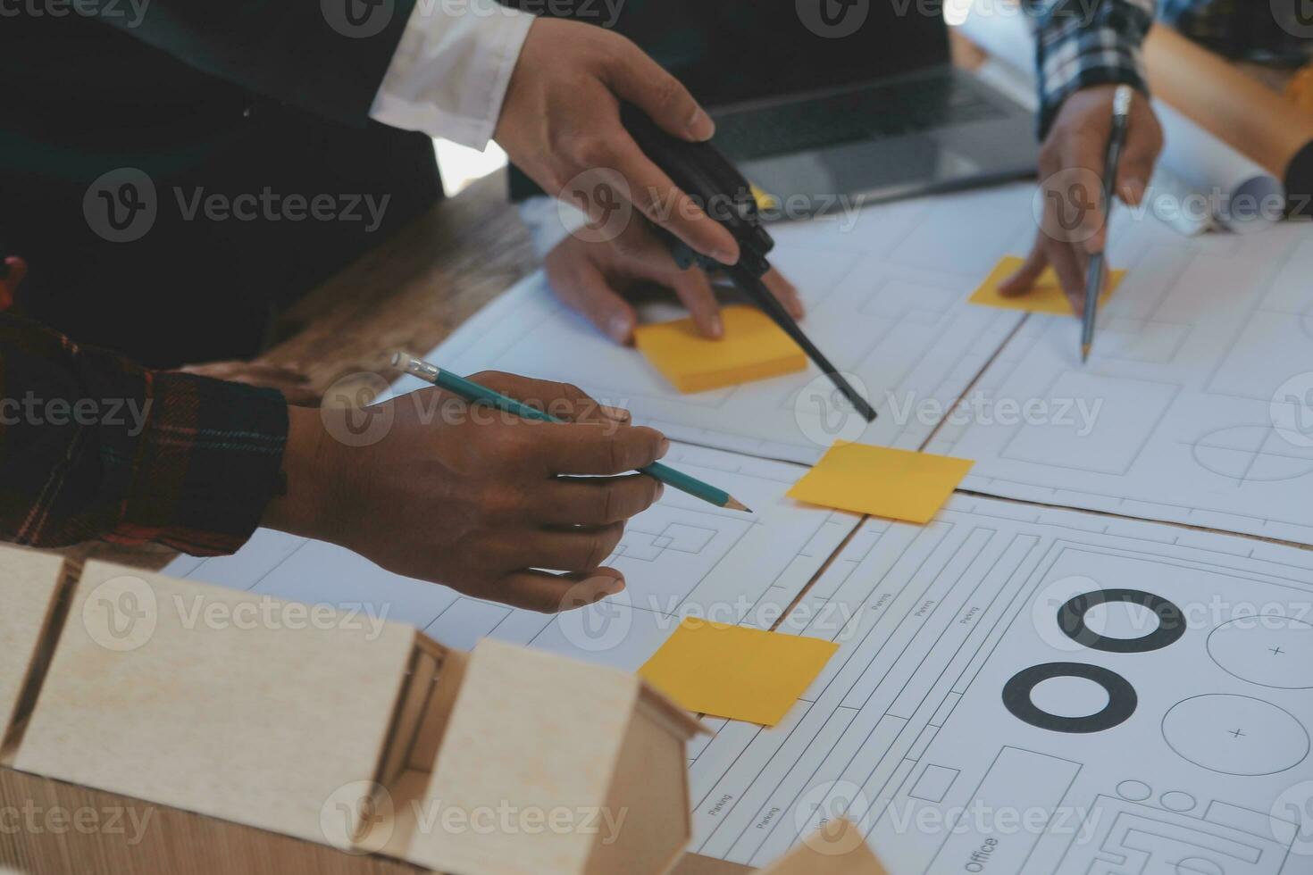 Construction and structure concept of Engineer or architect meeting for project working with partner and engineering tools on model building and blueprint in working site, contract for both companies. photo