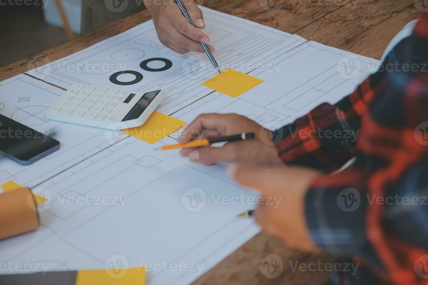 Construction and structure concept of Engineer or architect meeting for project working with partner and engineering tools on model building and blueprint in working site, contract for both companies. photo