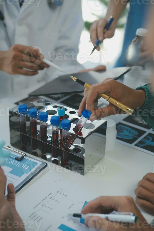 Cropped image of successful medical doctors discussing diagnosis during the conference photo