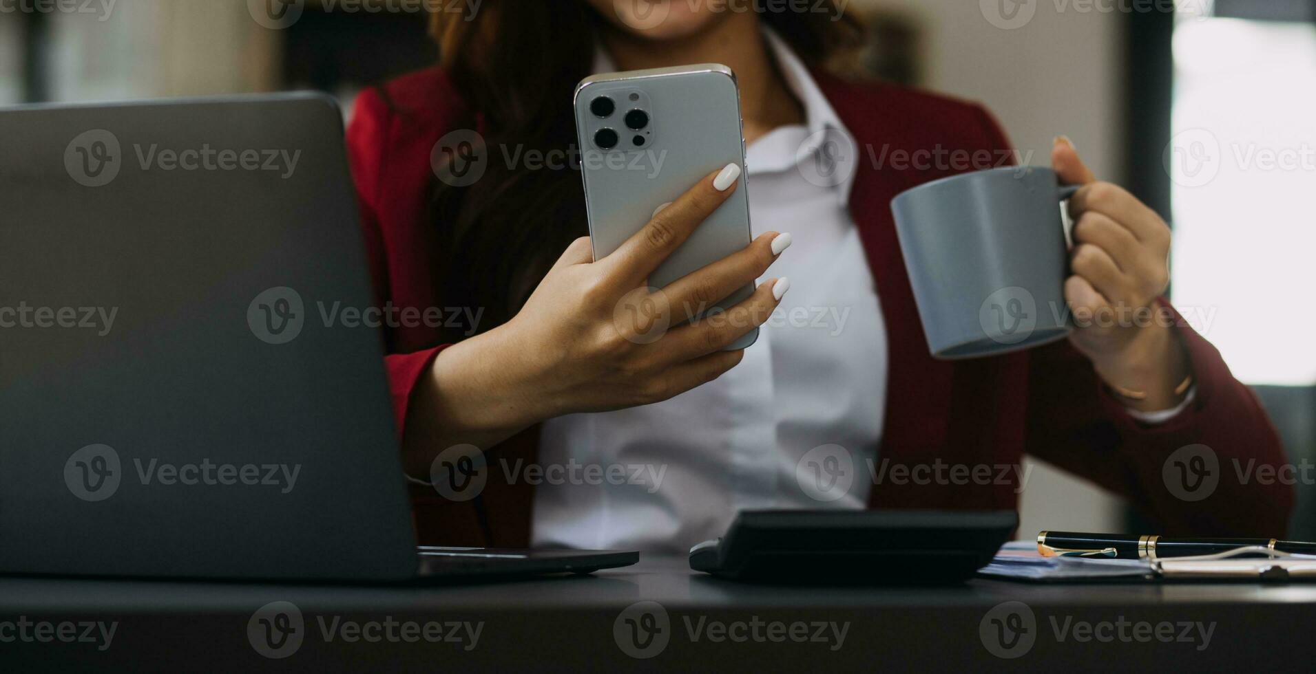 Entrepreneur Asian businessman and businesswoman discussing new business project in tablet in modern Meeting In Modern Office, Asian business casual concept. photo