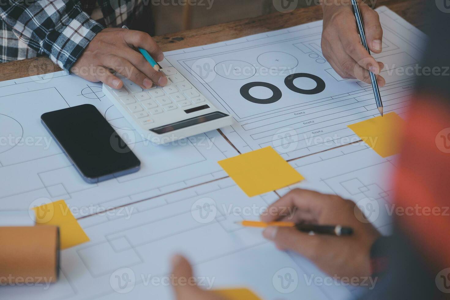 Engineer Teamwork Meeting, Drawing working on blueprint meeting for project working with partner on model building and engineering tools in working site, Construction and structure concept. photo