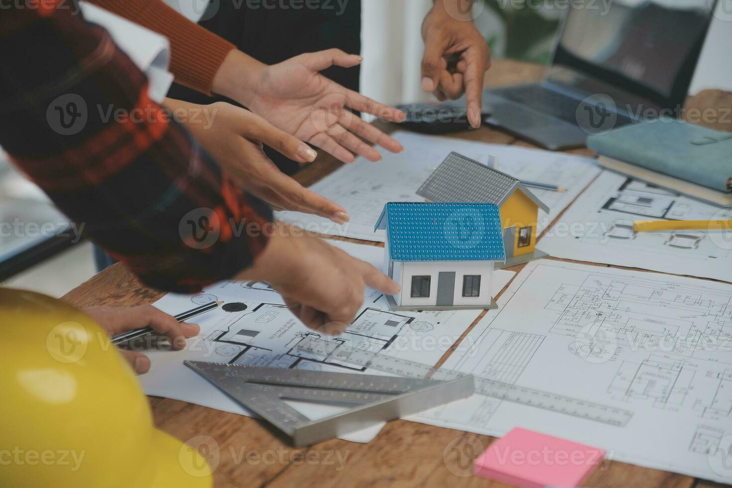 Engineer Teamwork Meeting, Drawing working on blueprint meeting for project working with partner on model building and engineering tools in working site, Construction and structure concept. photo