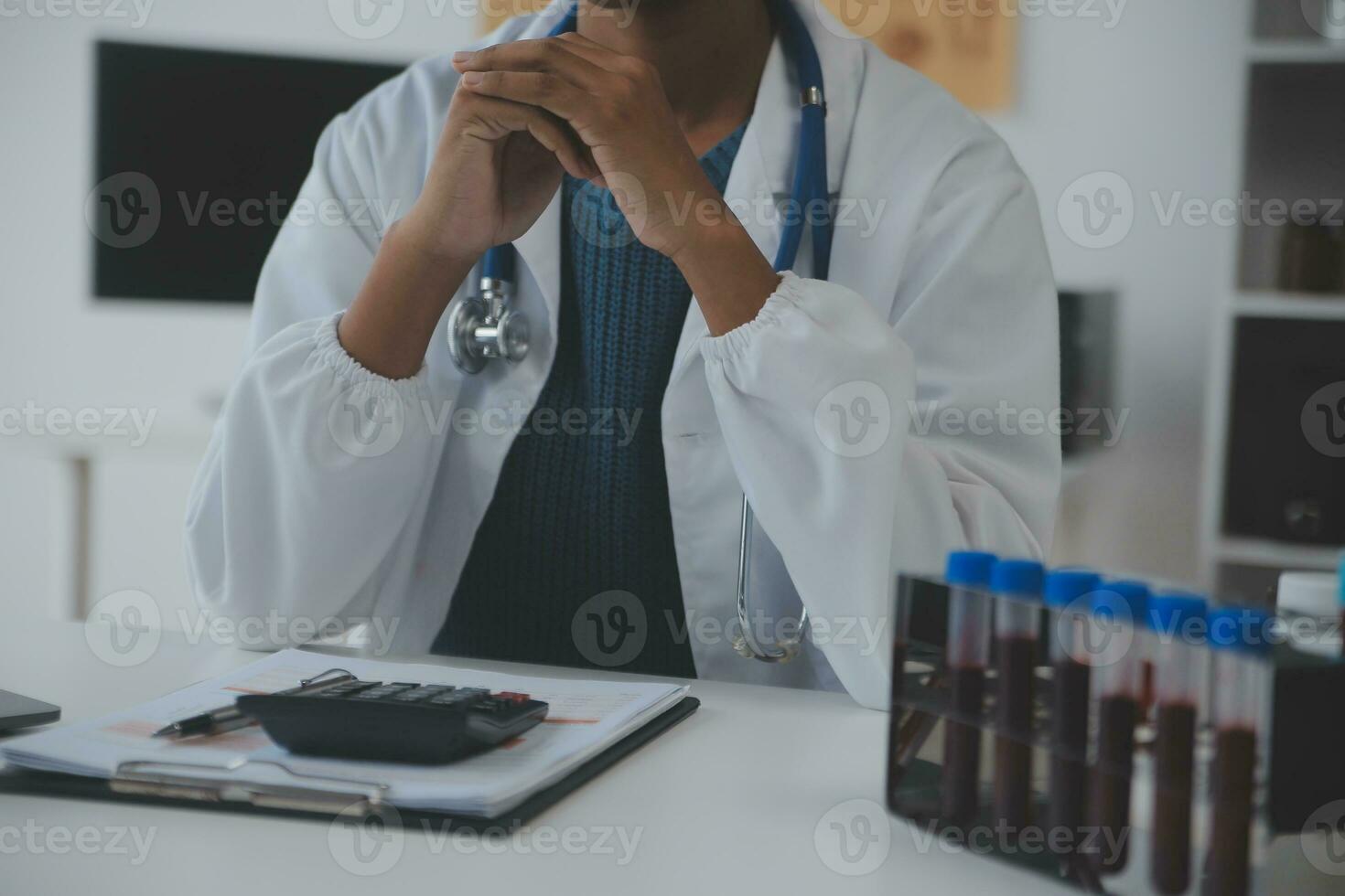 Professional lab. Amazing longhaired medical worker wearing uniform while using microscope during research photo
