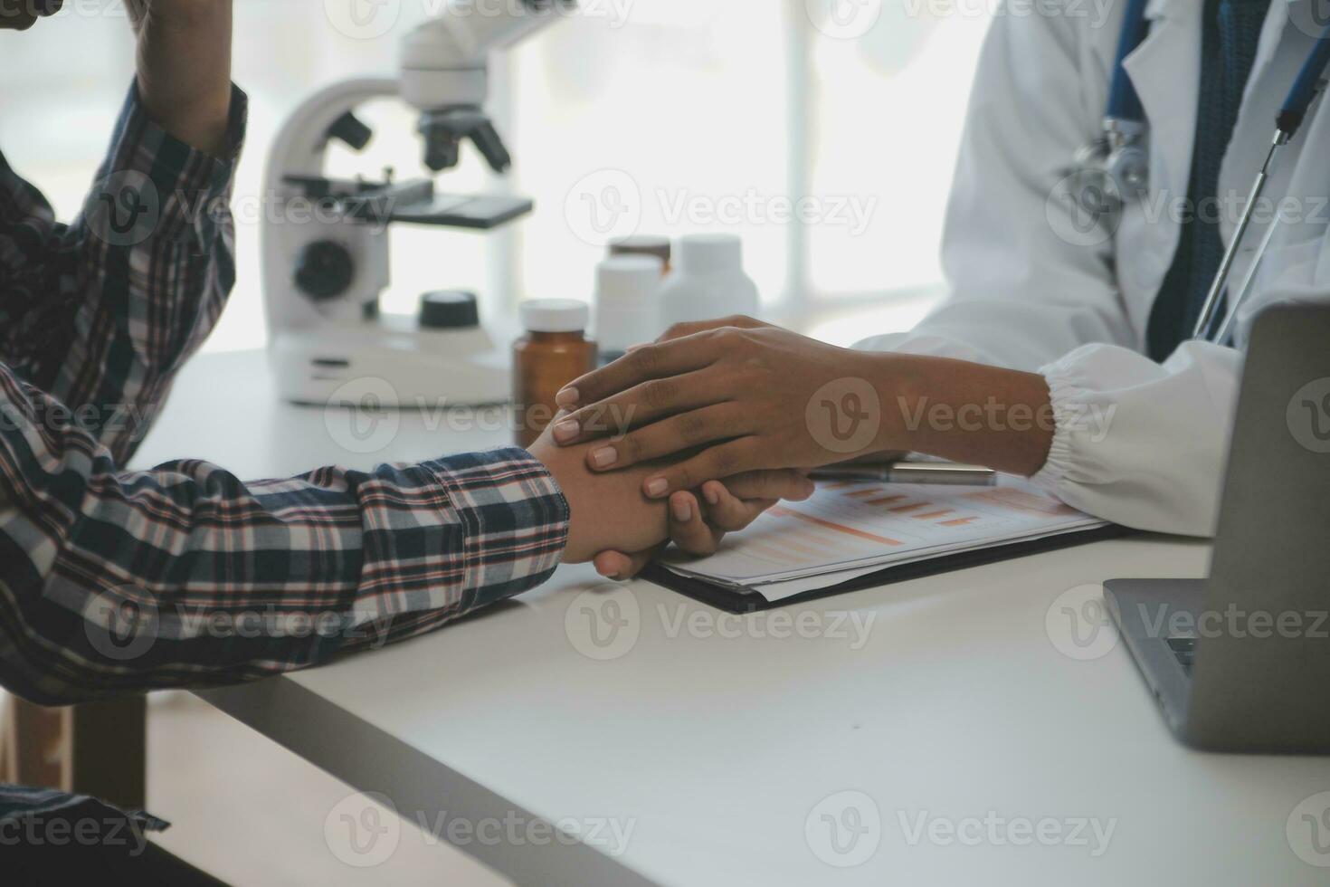 Professional lab. Amazing longhaired medical worker wearing uniform while using microscope during research photo