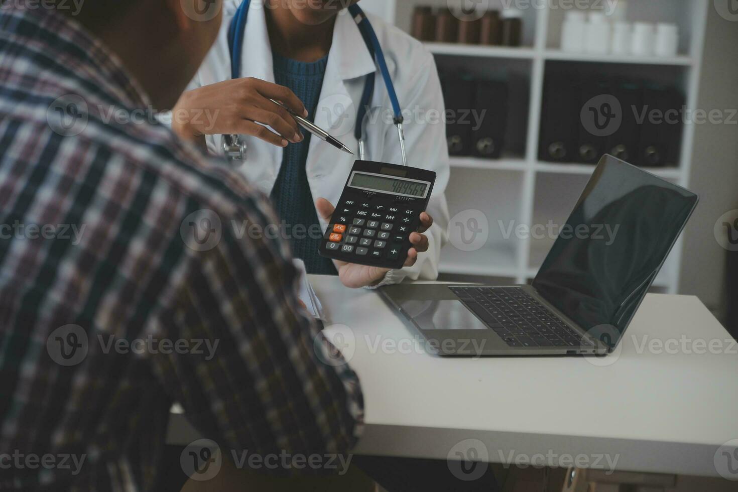 Professional lab. Amazing longhaired medical worker wearing uniform while using microscope during research photo