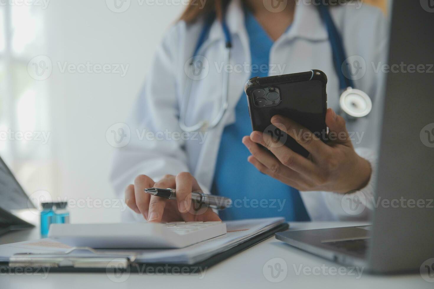 Professional lab. Amazing longhaired medical worker wearing uniform while using microscope during research photo