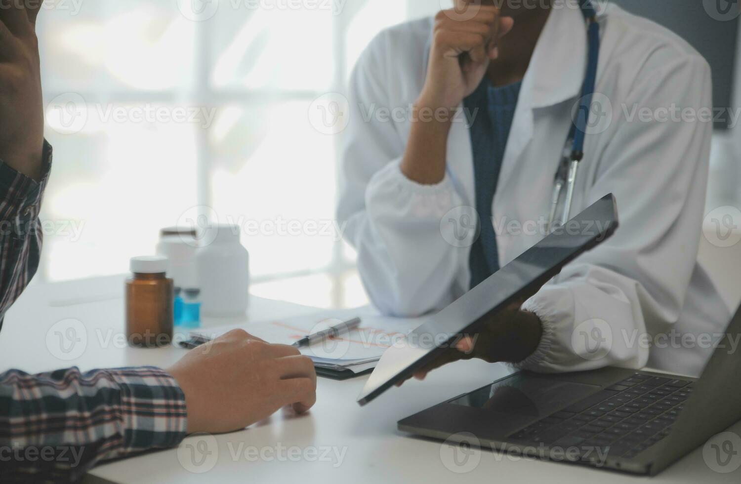 Professional lab. Amazing longhaired medical worker wearing uniform while using microscope during research photo