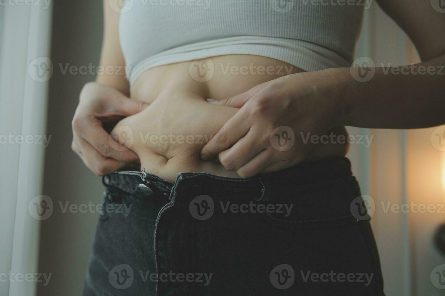 Fat woman measuring , fat woman fat belly chubby paunchy sport recreation health care lose belly fat do not exercise concept photo