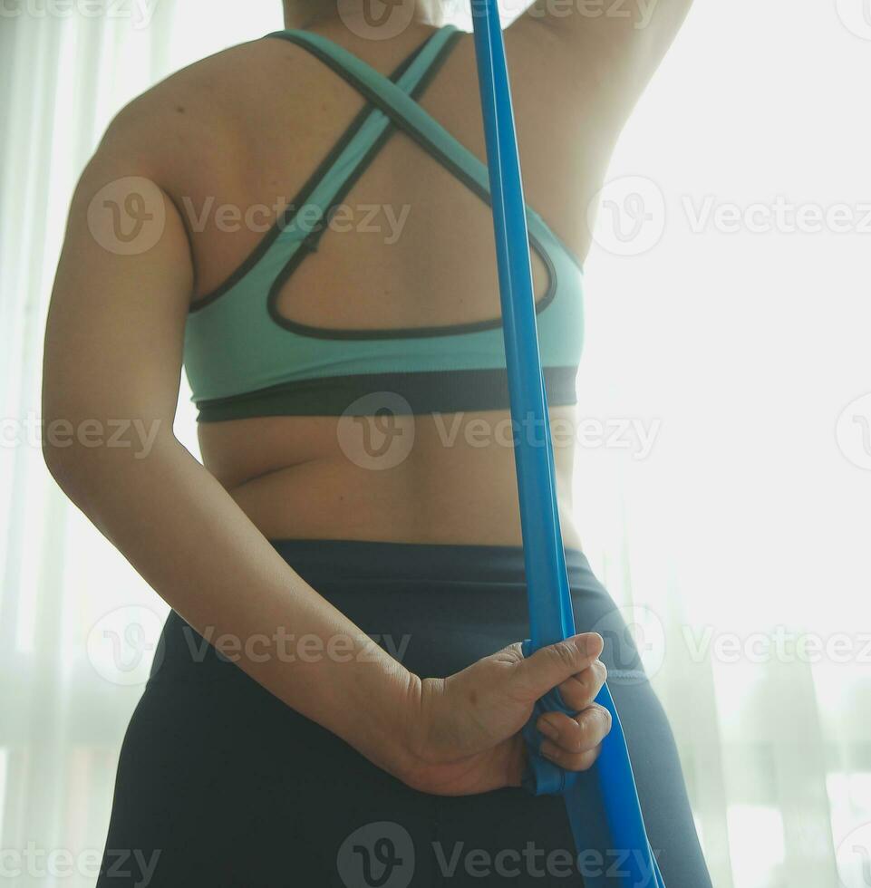 Close up image of attractive fit woman in gym photo
