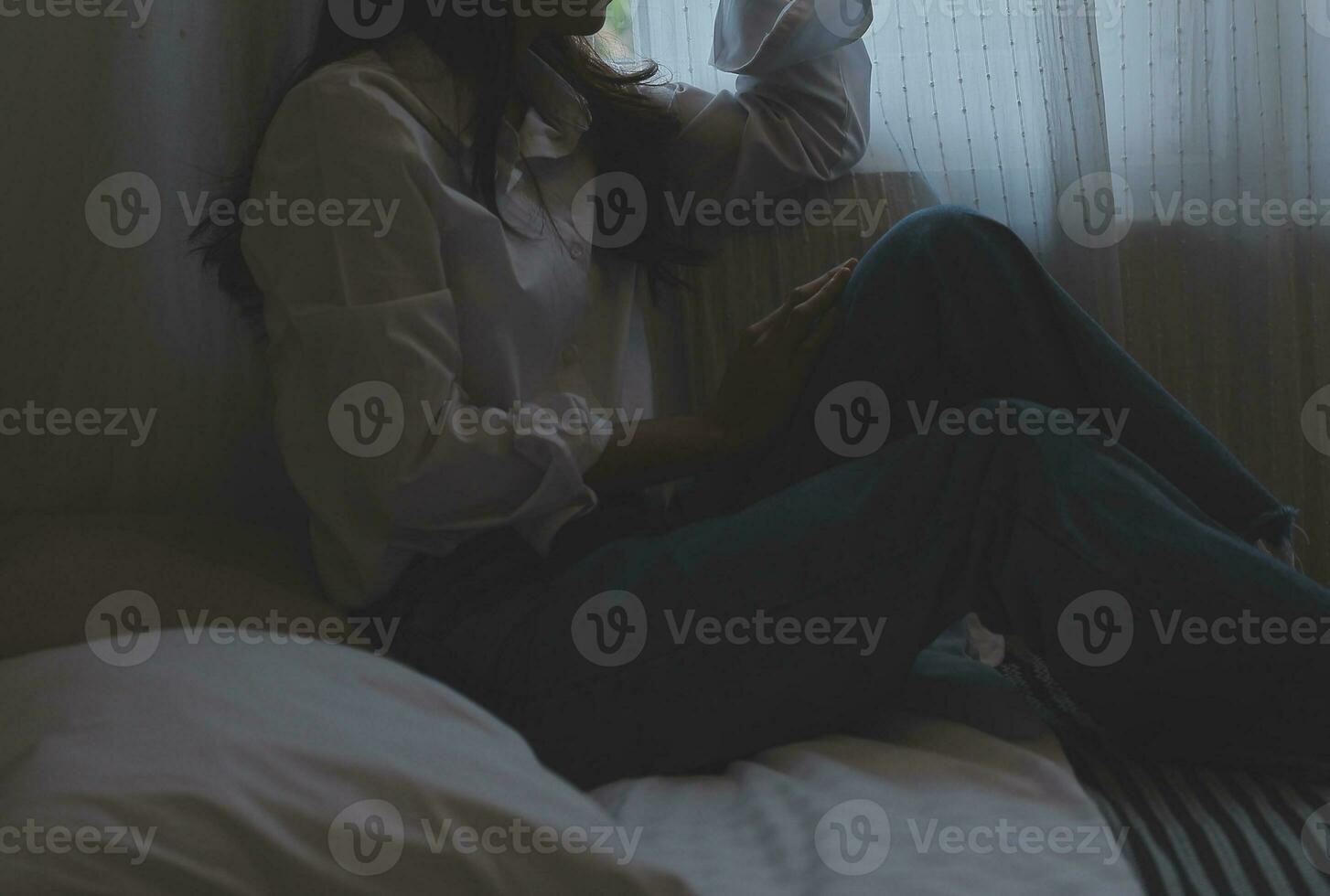 Upset woman having a fight with a man at home. Hispanic wife slapping the face of her husband during an argument because of their relationship problems photo