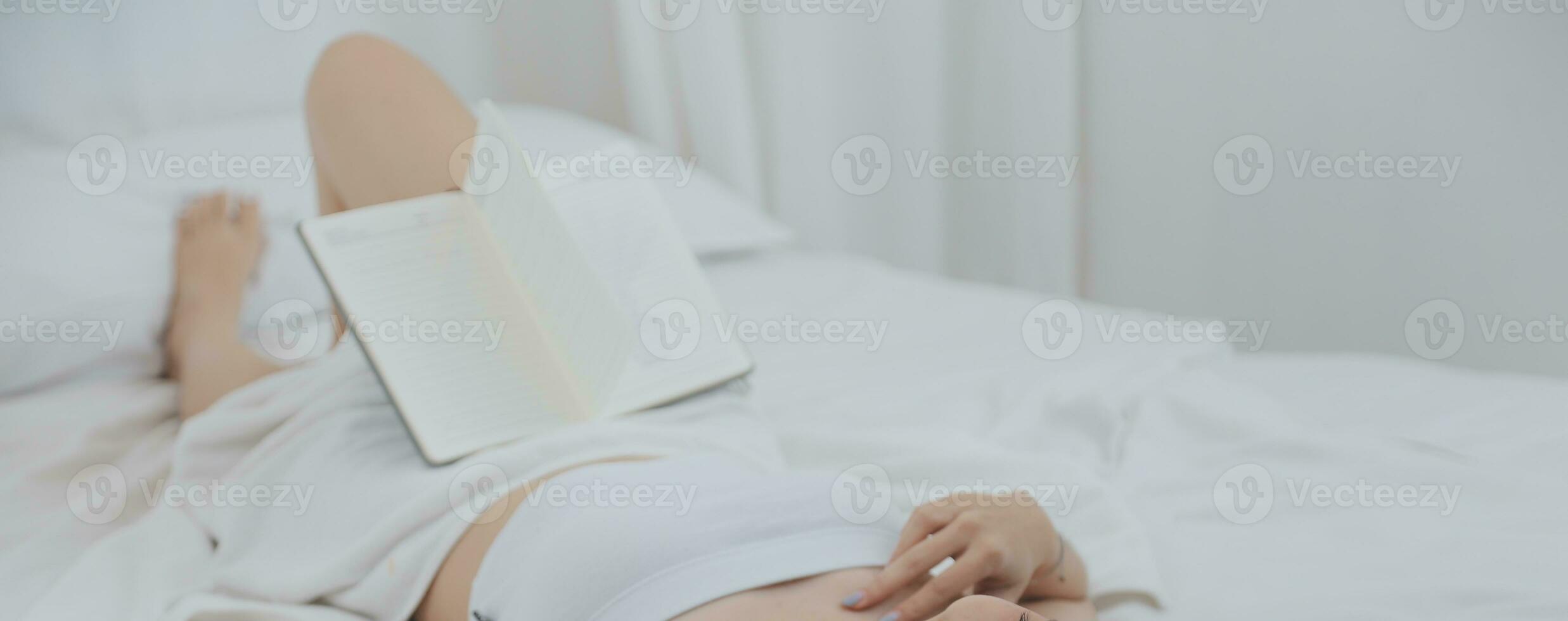Young attractive girl Spanish appearance delighted with the surprise. And The Morning Started With An Unexpected Healthy Breakfast. In surprise, she waved her hands and rejoices at what is happening. photo