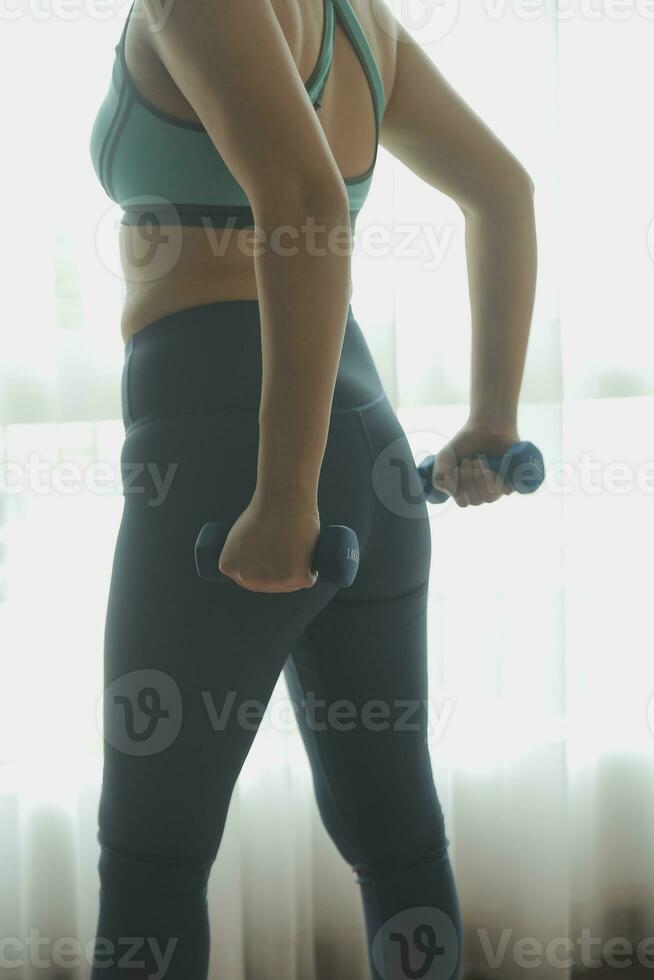 Close up image of attractive fit woman in gym photo