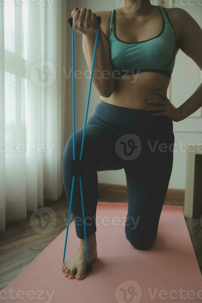 Close up image of attractive fit woman in gym photo