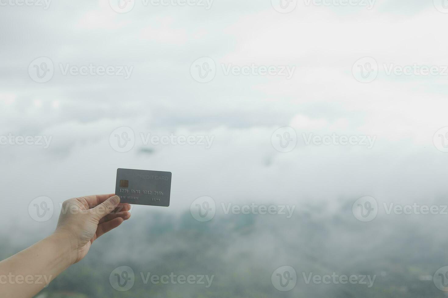 online payment, young woman holding credit card and touching on smartphone screen, copy space photo