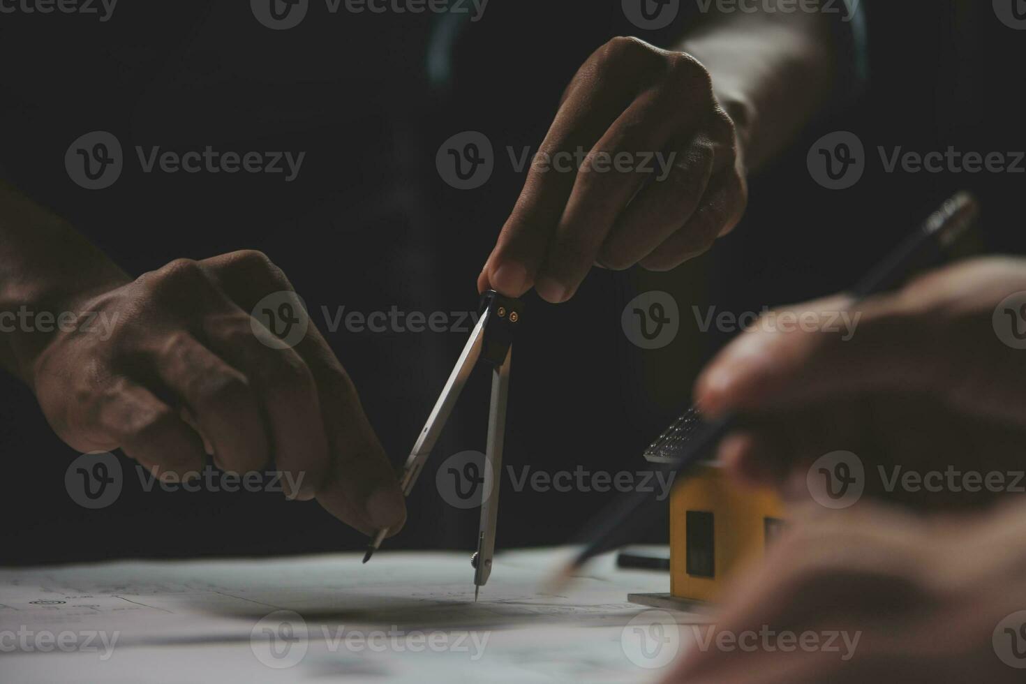 Engineer Teamwork Meeting, Drawing working on blueprint meeting for project working with partner on model building and engineering tools in working site, Construction and structure concept. photo