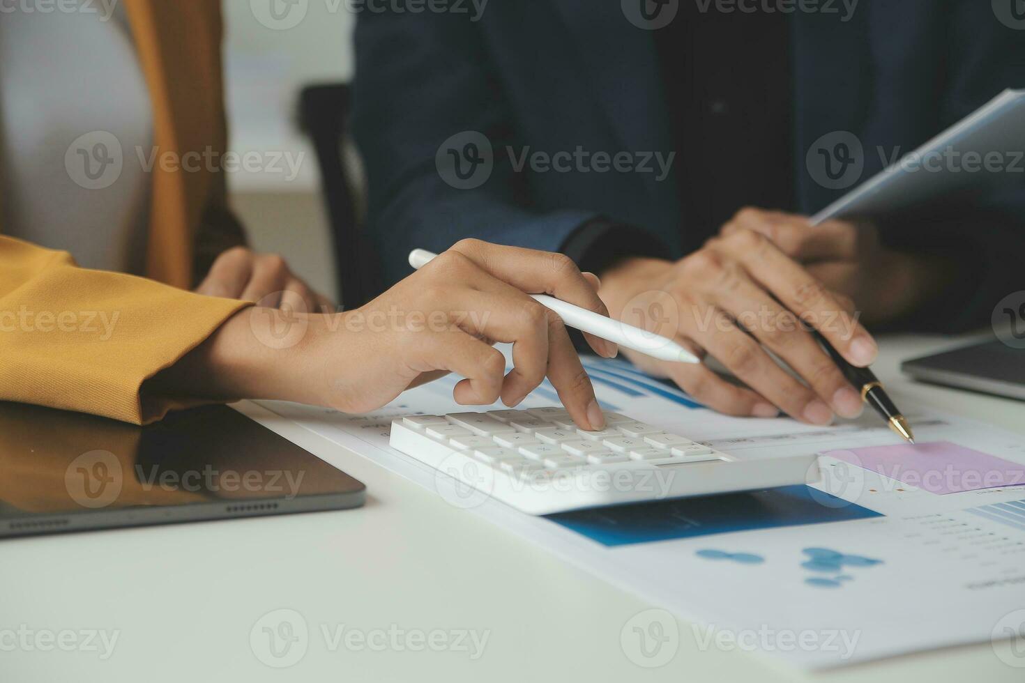 Financial Business team present. Business man hands hold documents with financial statistic stock photo, discussion, and analysis report data the charts and graphs. Finance Financial concept photo