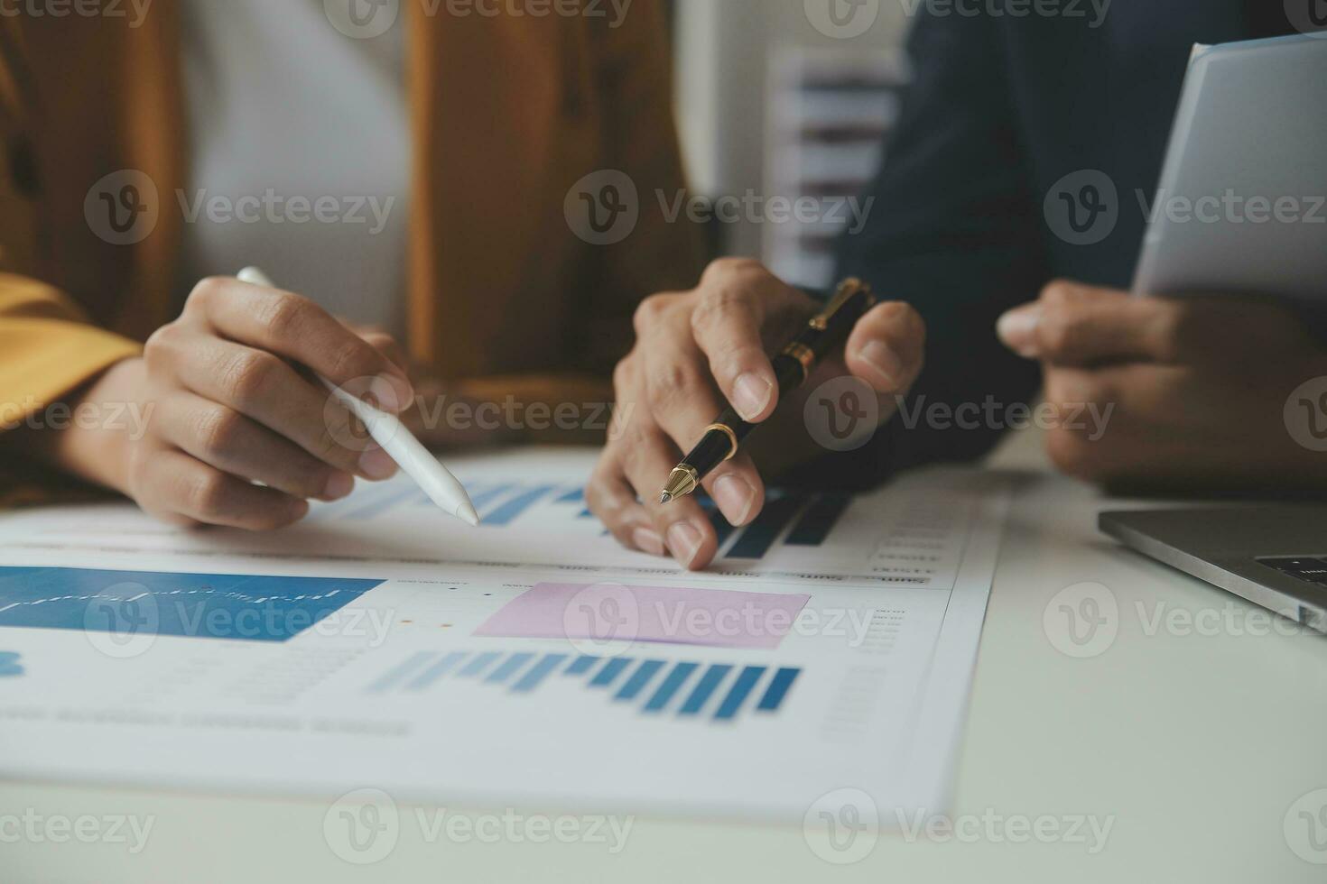 Financial Business team present. Business man hands hold documents with financial statistic stock photo, discussion, and analysis report data the charts and graphs. Finance Financial concept photo