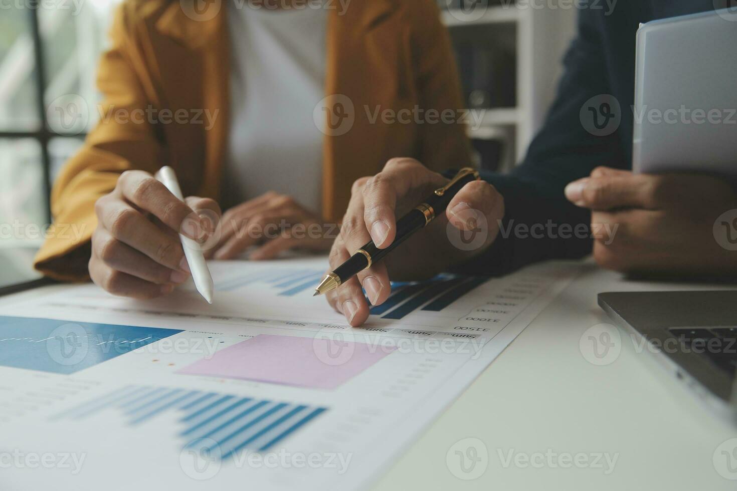 Financial Business team present. Business man hands hold documents with financial statistic stock photo, discussion, and analysis report data the charts and graphs. Finance Financial concept photo