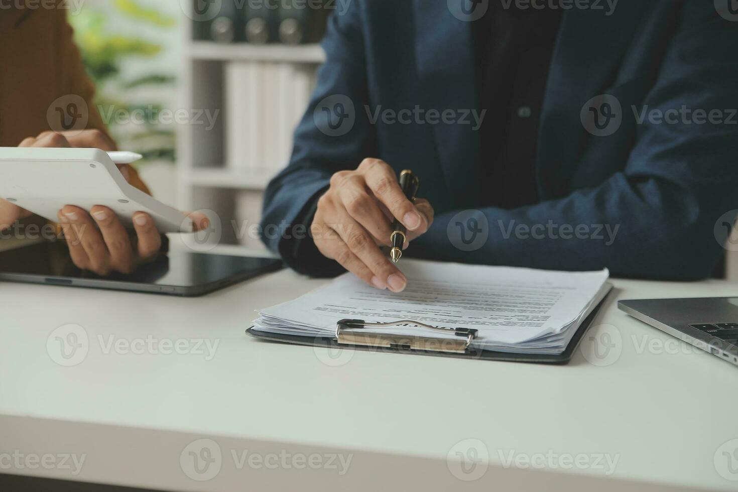 Financial Business team present. Business man hands hold documents with financial statistic stock photo, discussion, and analysis report data the charts and graphs. Finance Financial concept photo