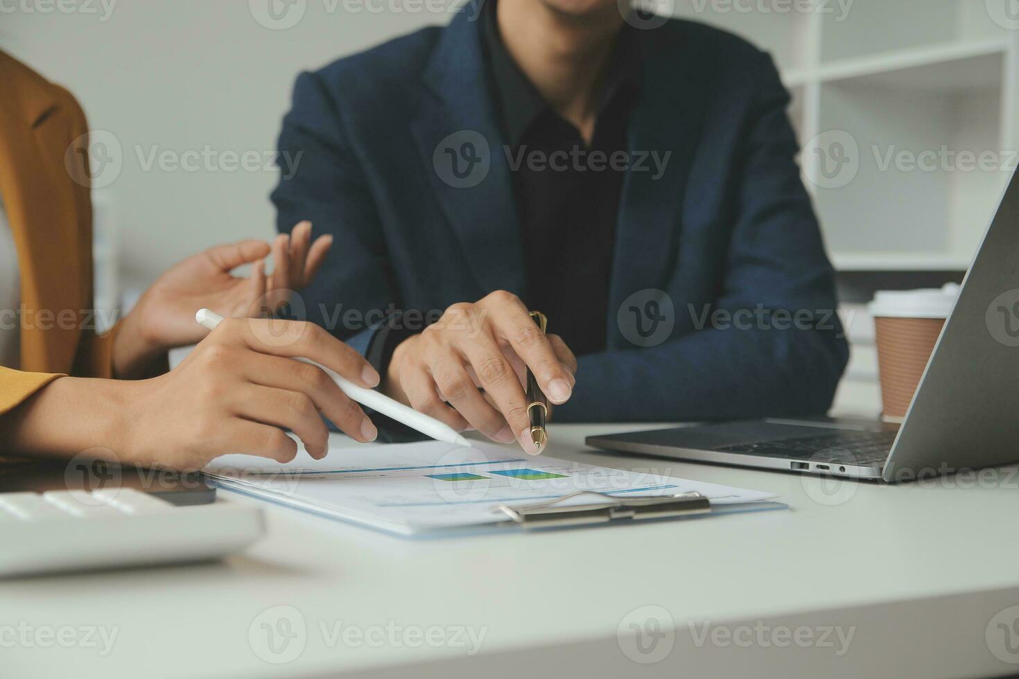 Financial Business team present. Business man hands hold documents with financial statistic stock photo, discussion, and analysis report data the charts and graphs. Finance Financial concept photo