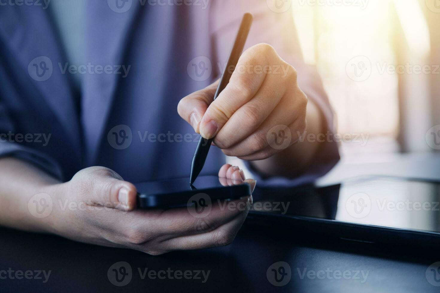 Asian Business woman using calculator and laptop for doing math finance on an office desk, tax, report, accounting, statistics, and analytical research concept photo